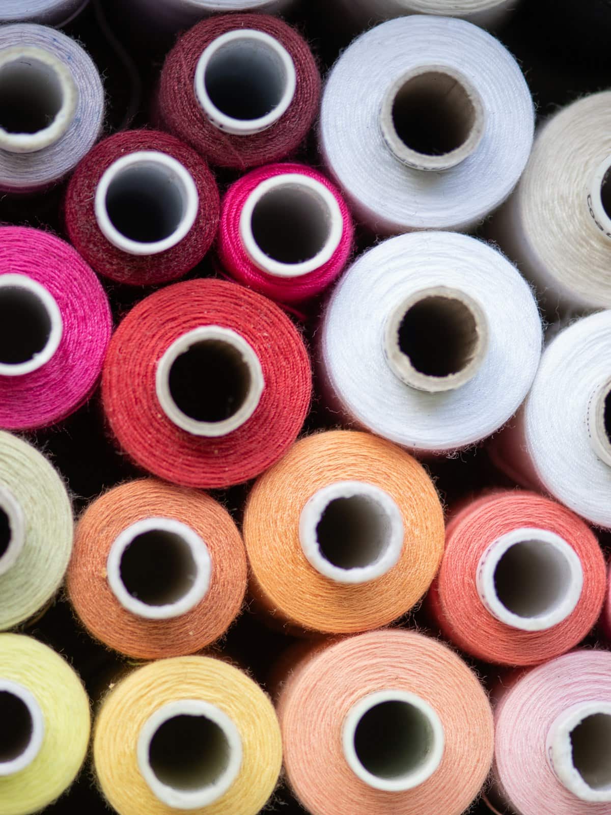 Colorful tailoring threads prepared inside the atelier