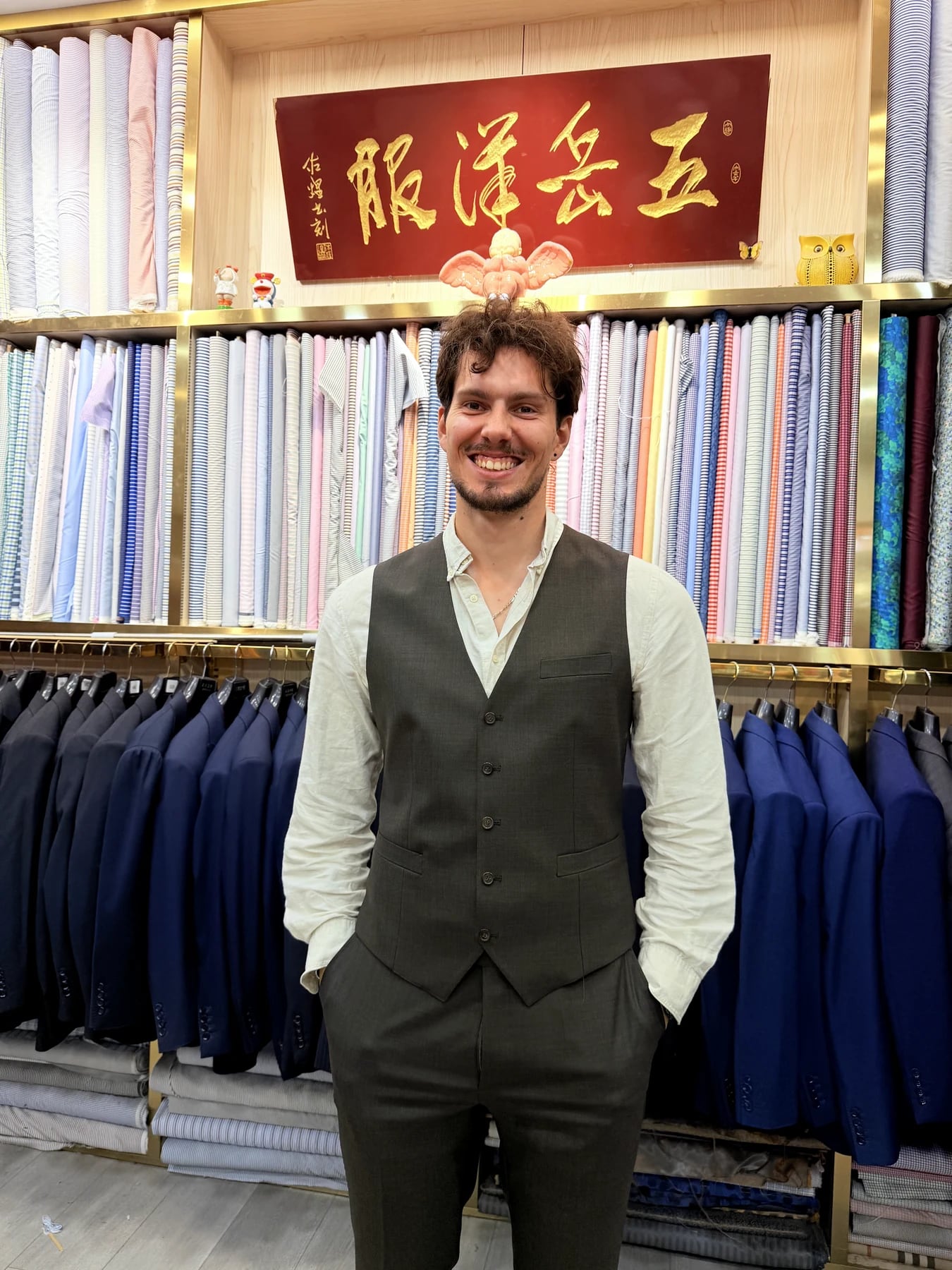 Full front view of the matching grey waistcoat and trousers inside Wuyue