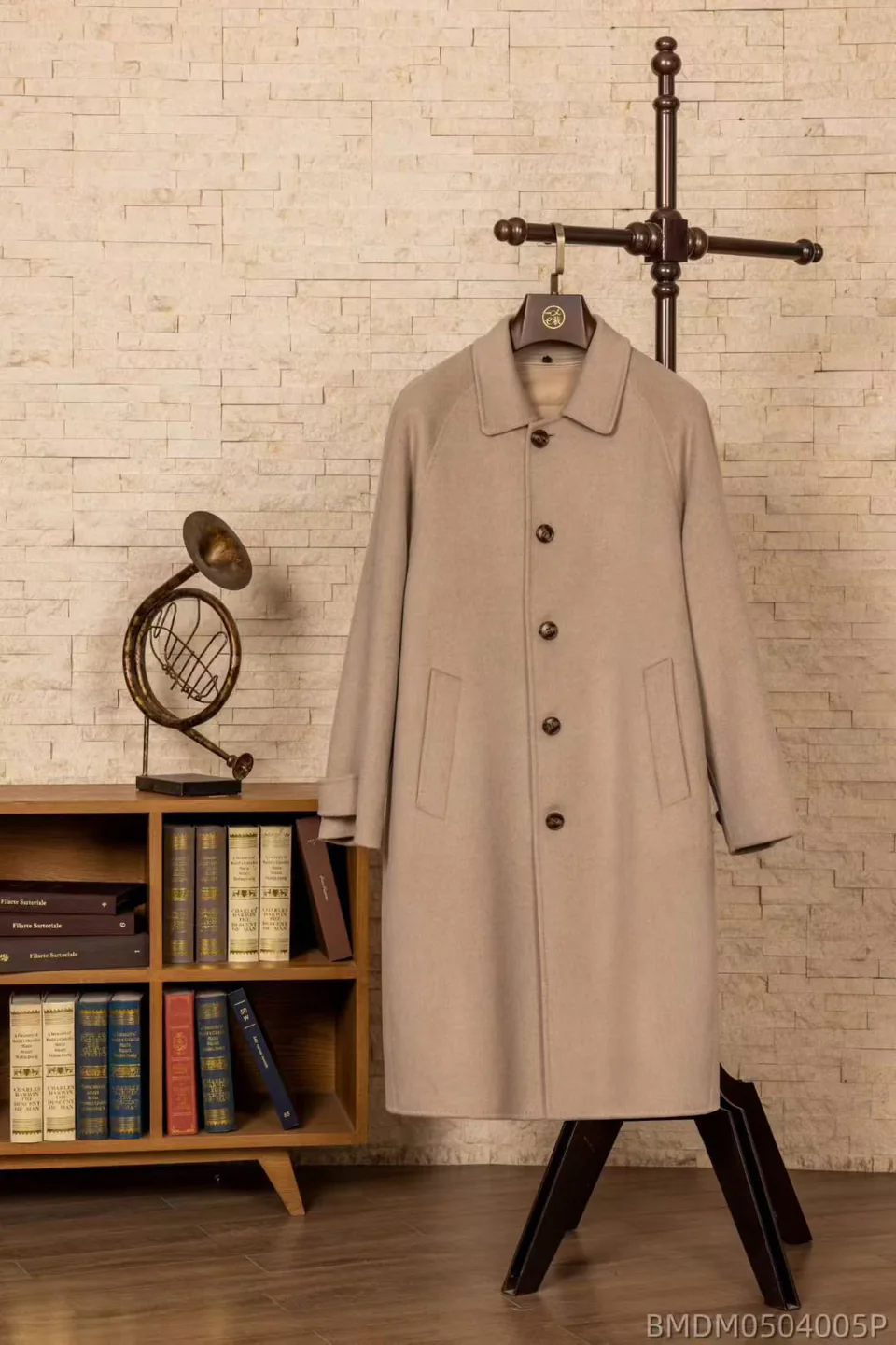 Light neutral custom topcoat displayed in the Wuyue Shanghai showroom