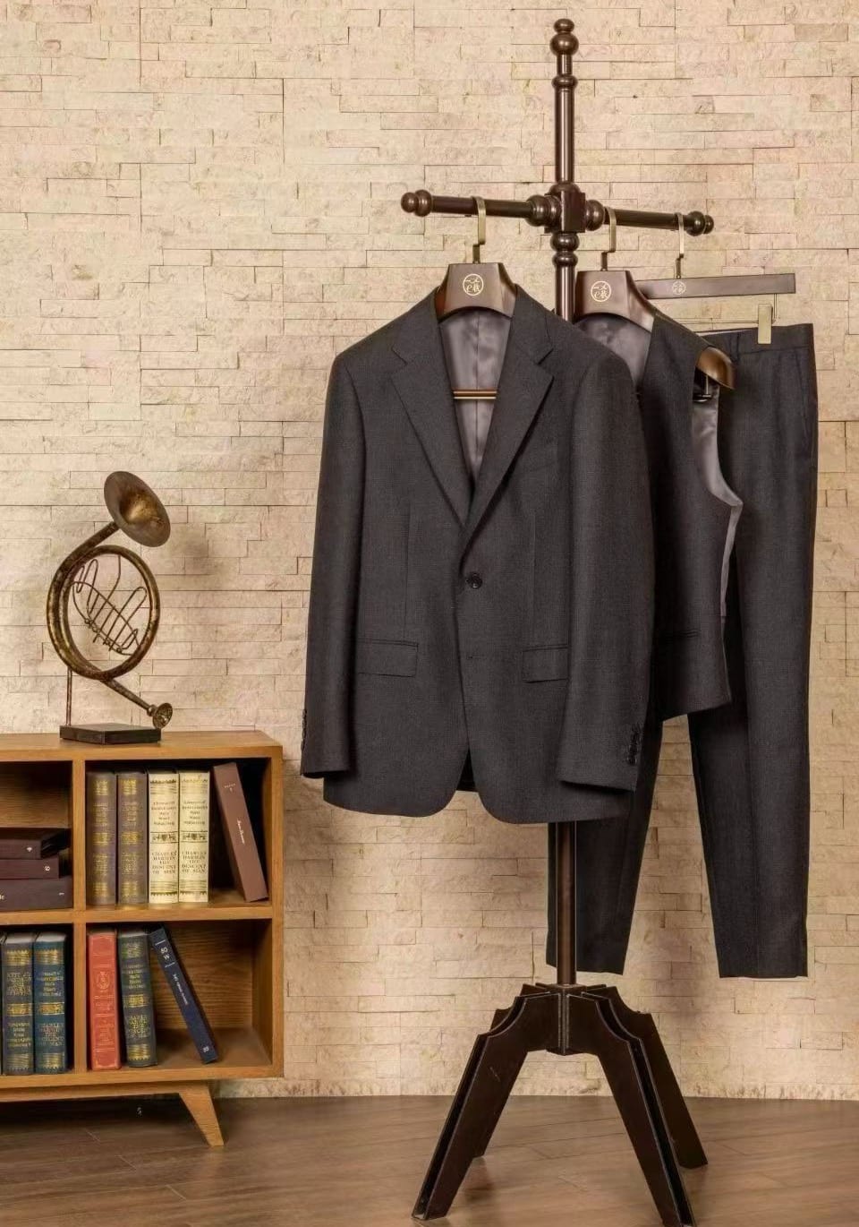Full look of a charcoal-brown custom suit at Wuyue Shanghai